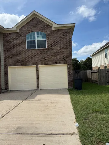 a front view of house with a yard