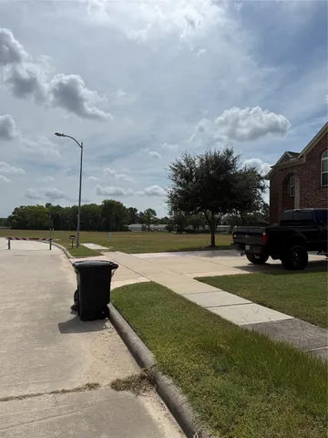 a view of a terrace with yard
