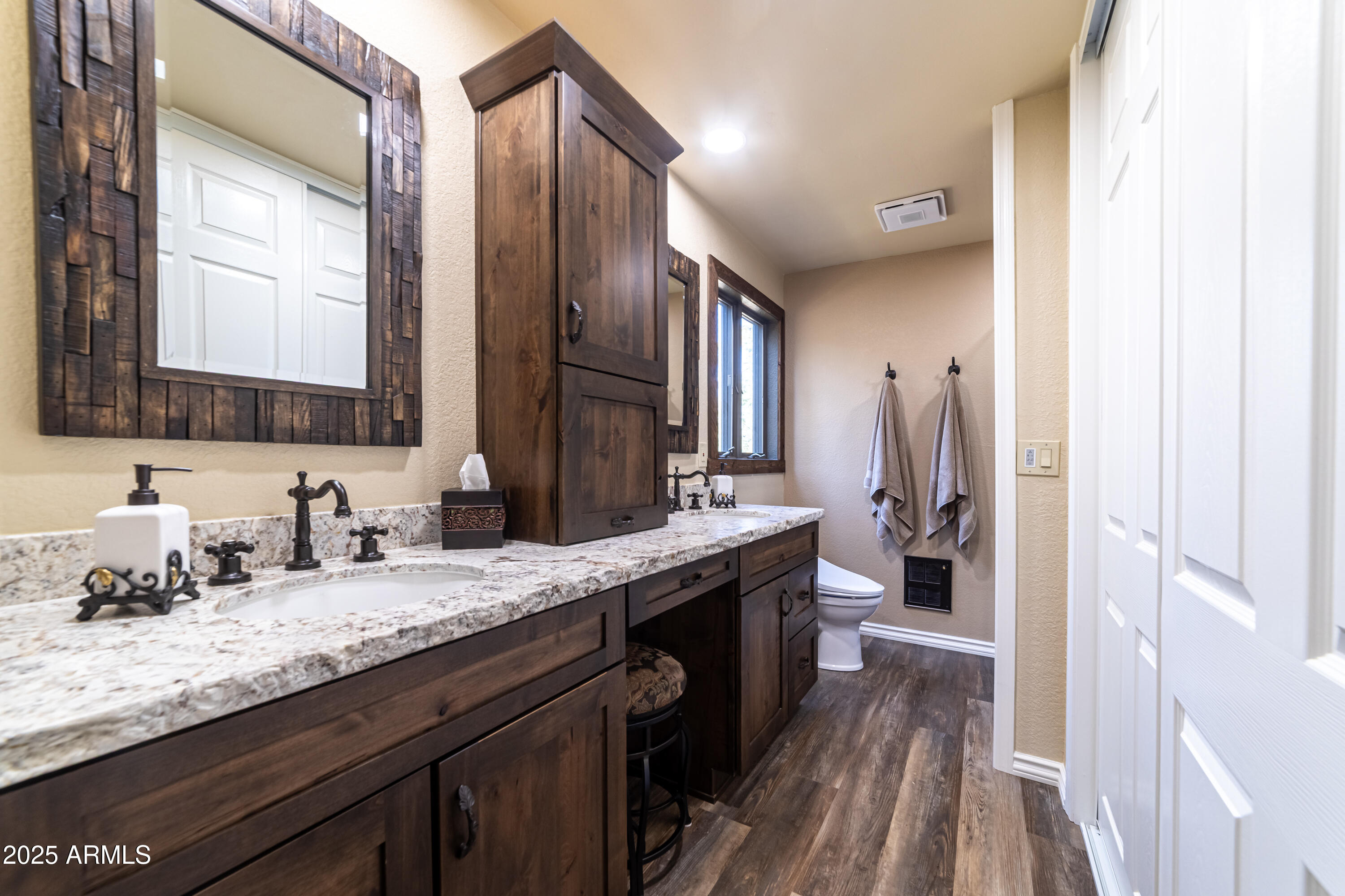 3929 East Sheldon Road Prescott, AZ 86303 - Photo 20 of 36 a bathroom with a granite countertop double vanity sink and a mirror