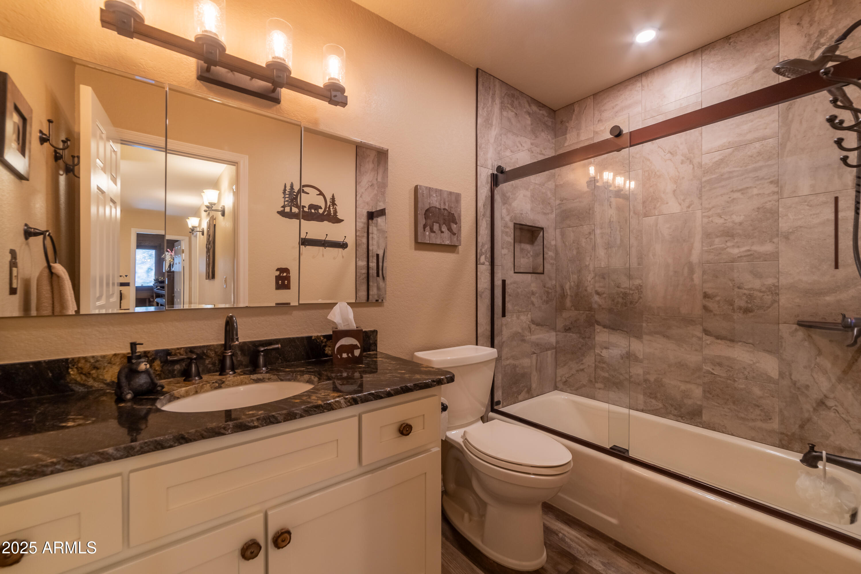 3929 East Sheldon Road Prescott, AZ 86303 - Photo 26 of 36 a bathroom with a sink a toilet and shower