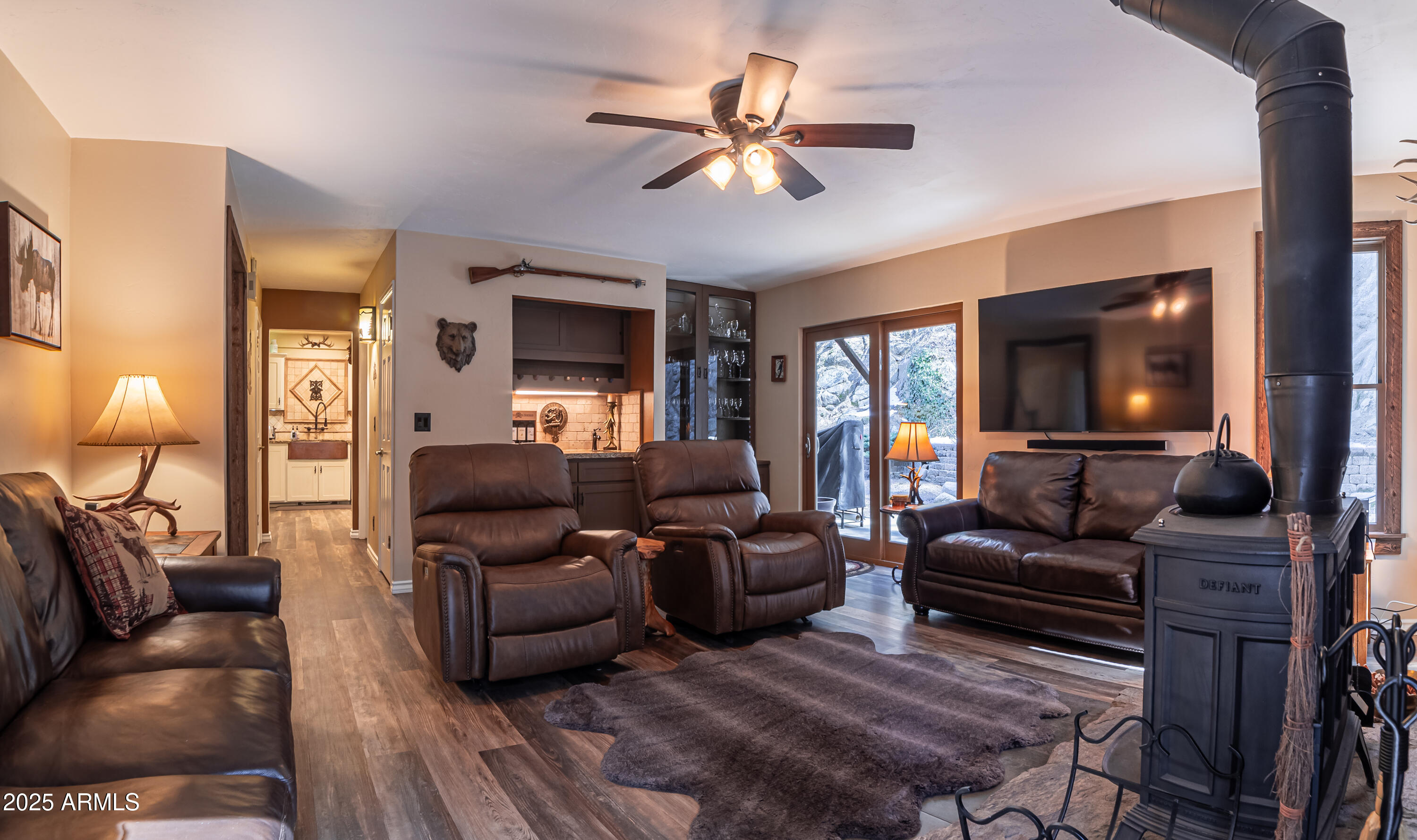 3929 East Sheldon Road Prescott, AZ 86303 - Photo 9 of 36 a living room with furniture and a flat screen tv
