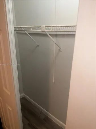 a view of small space with racks on the wall