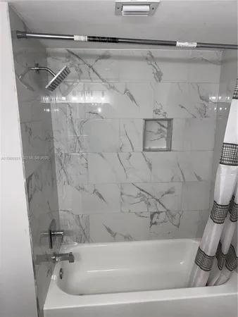 a bathroom with a bathtub