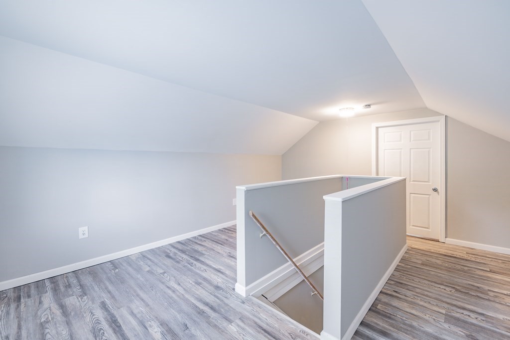 22 Methuen Street Springfield, MA 01119 - Photo 29 of 36 a view of a hallway with wooden floor