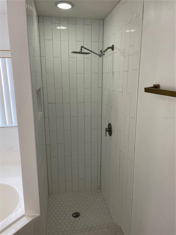 14111 Colonial Spring Way Orlando, FL 32826 - Photo 15 of 26 a bathroom with a shower