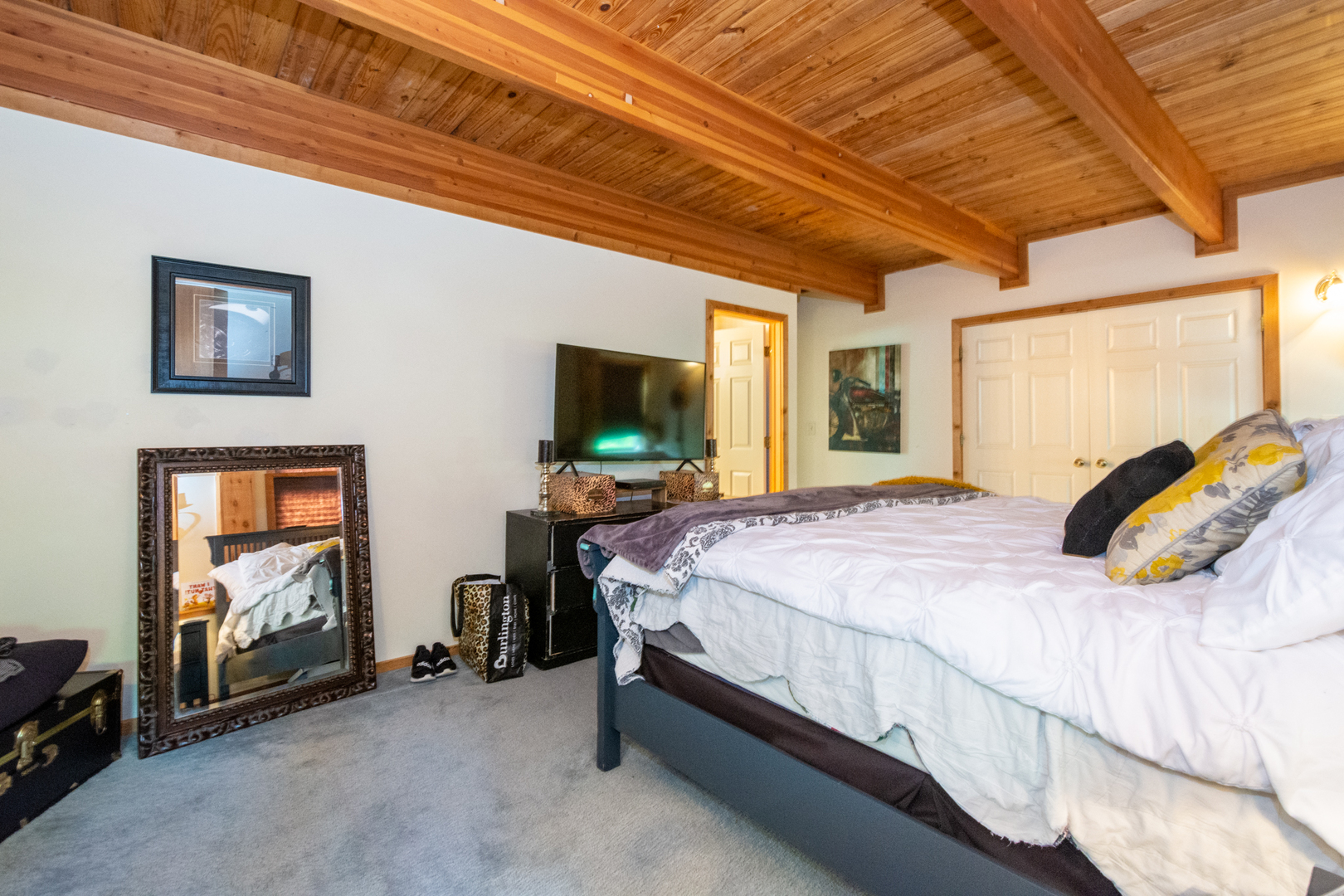 35259 North Wilson Road Ingleside, IL 60041 - Photo 27 of 44 a bedroom with a bed and a flat tv screen tv