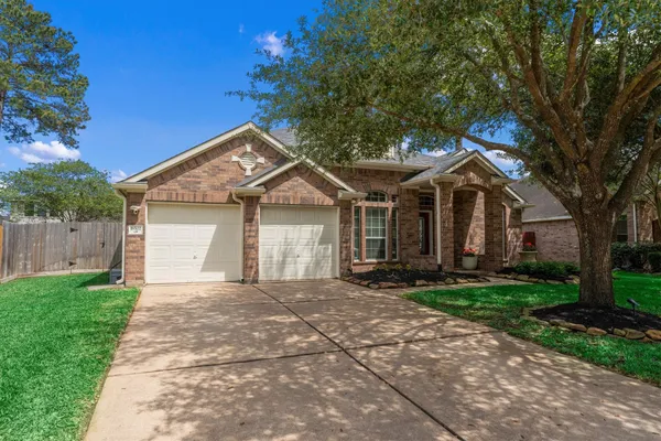 $415,000 | 18502 Cascade Timbers Lane, Tomball, TX 77377
