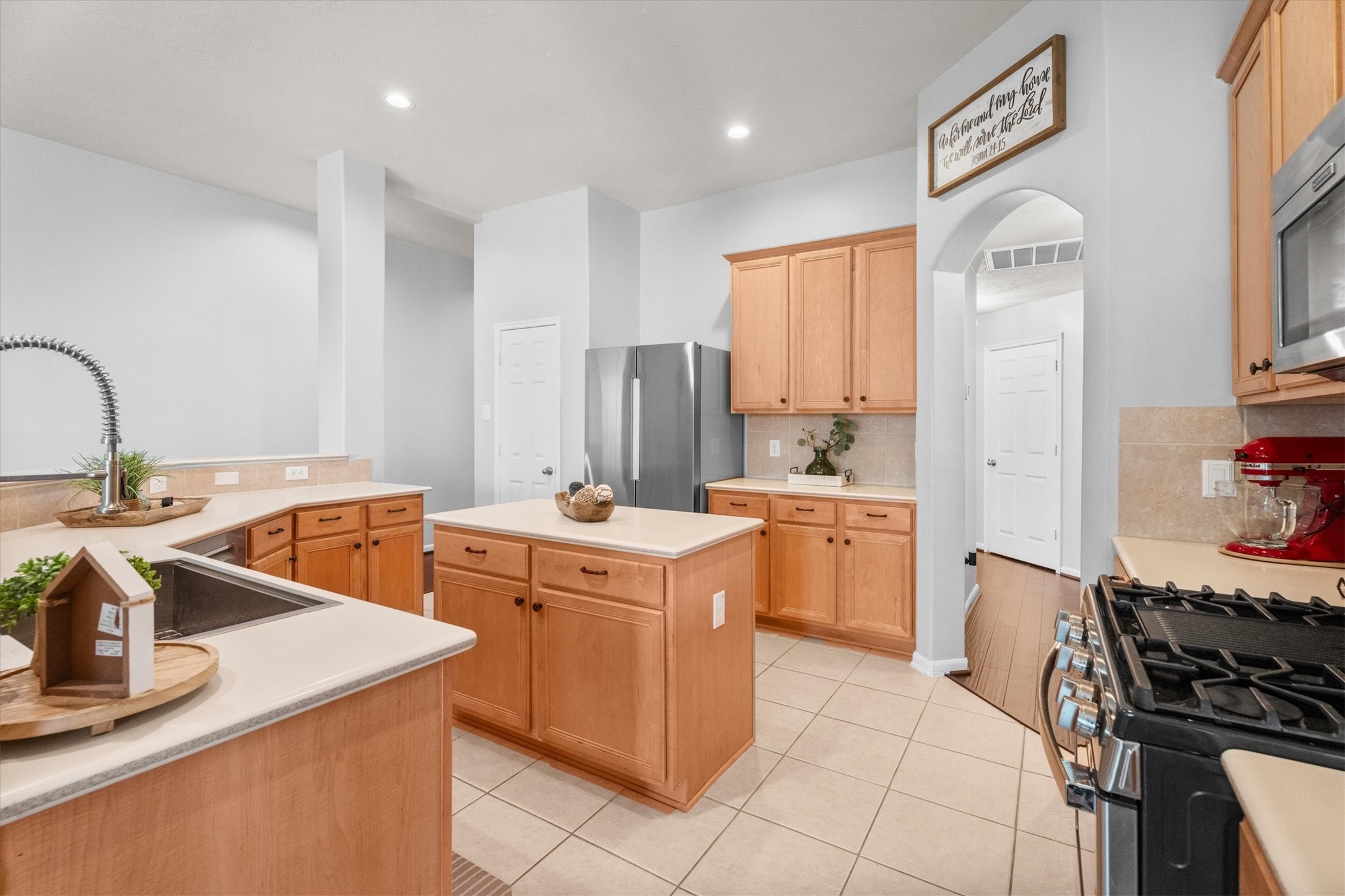 18502 Cascade Timbers Lane Tomball, TX 77377 - Photo 12 of 43 Designed with room for everyone, this kitchen allows multiple people to cook and connect with ease.