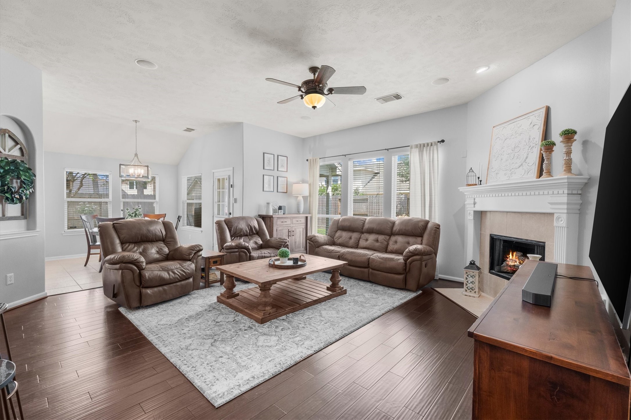 18502 Cascade Timbers Lane Tomball, TX 77377 - Photo 16 of 43 The living room offers great versatility with plenty of space to arrange as you like, all while enjoying beautiful views of the backyard.