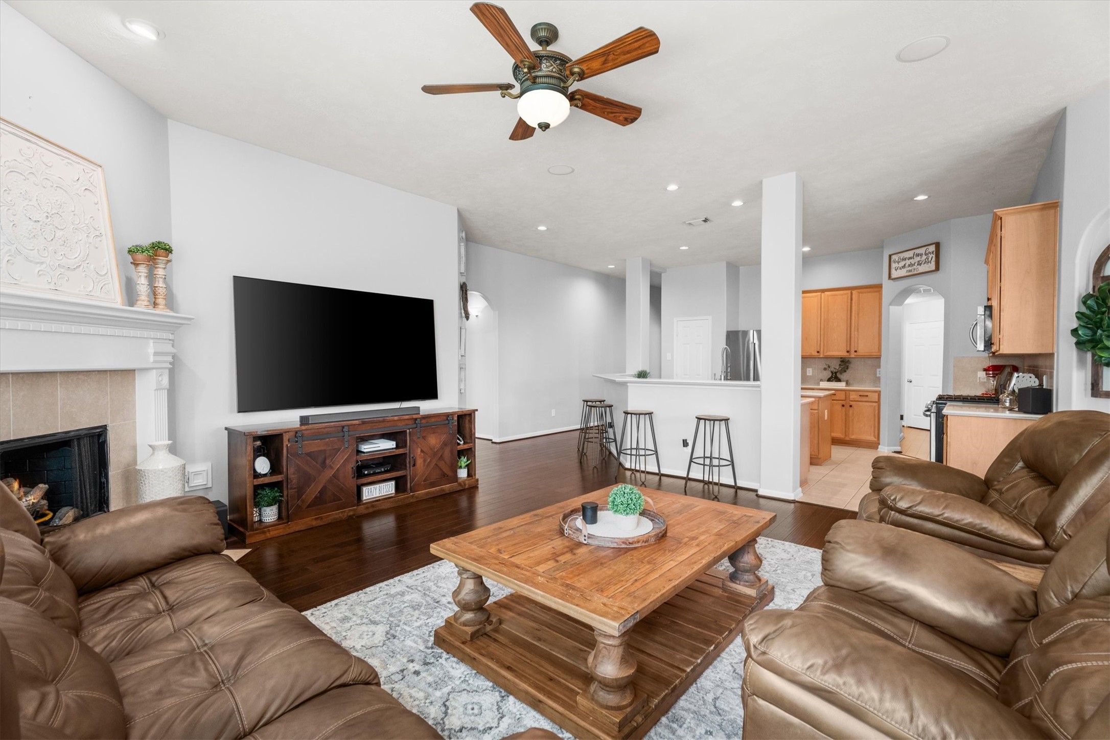 18502 Cascade Timbers Lane Tomball, TX 77377 - Photo 18 of 43 This living room naturally becomes everyone’s favorite place to gather.