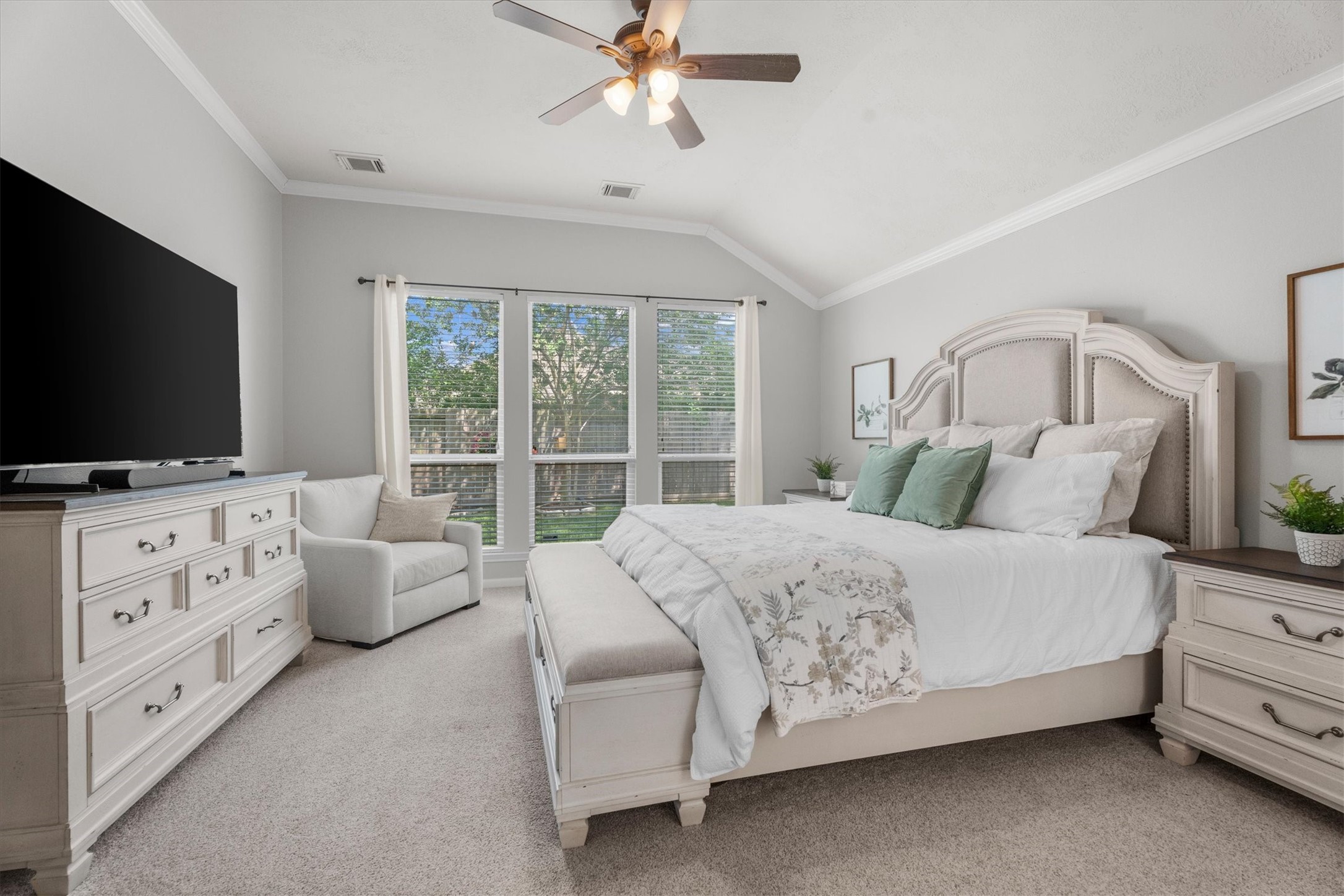 18502 Cascade Timbers Lane Tomball, TX 77377 - Photo 20 of 43 The large primary suite easily accommodates king-sized furnishings and a cozy seating area, paired with a stunning bathroom that feels like a private retreat.