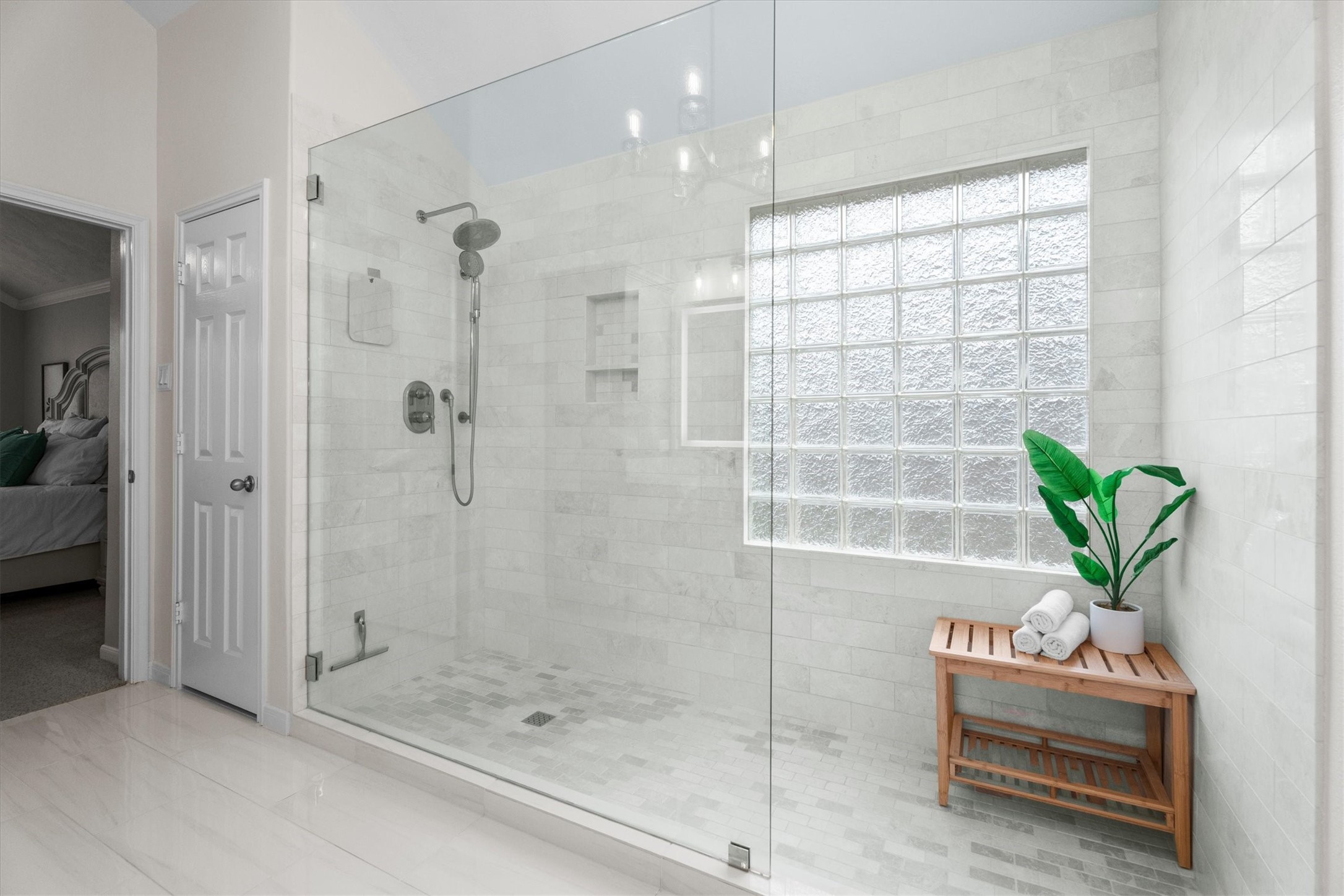 18502 Cascade Timbers Lane Tomball, TX 77377 - Photo 23 of 43 The bathroom features a stunning, oversized shower that brings a spa-like feel to everyday living.