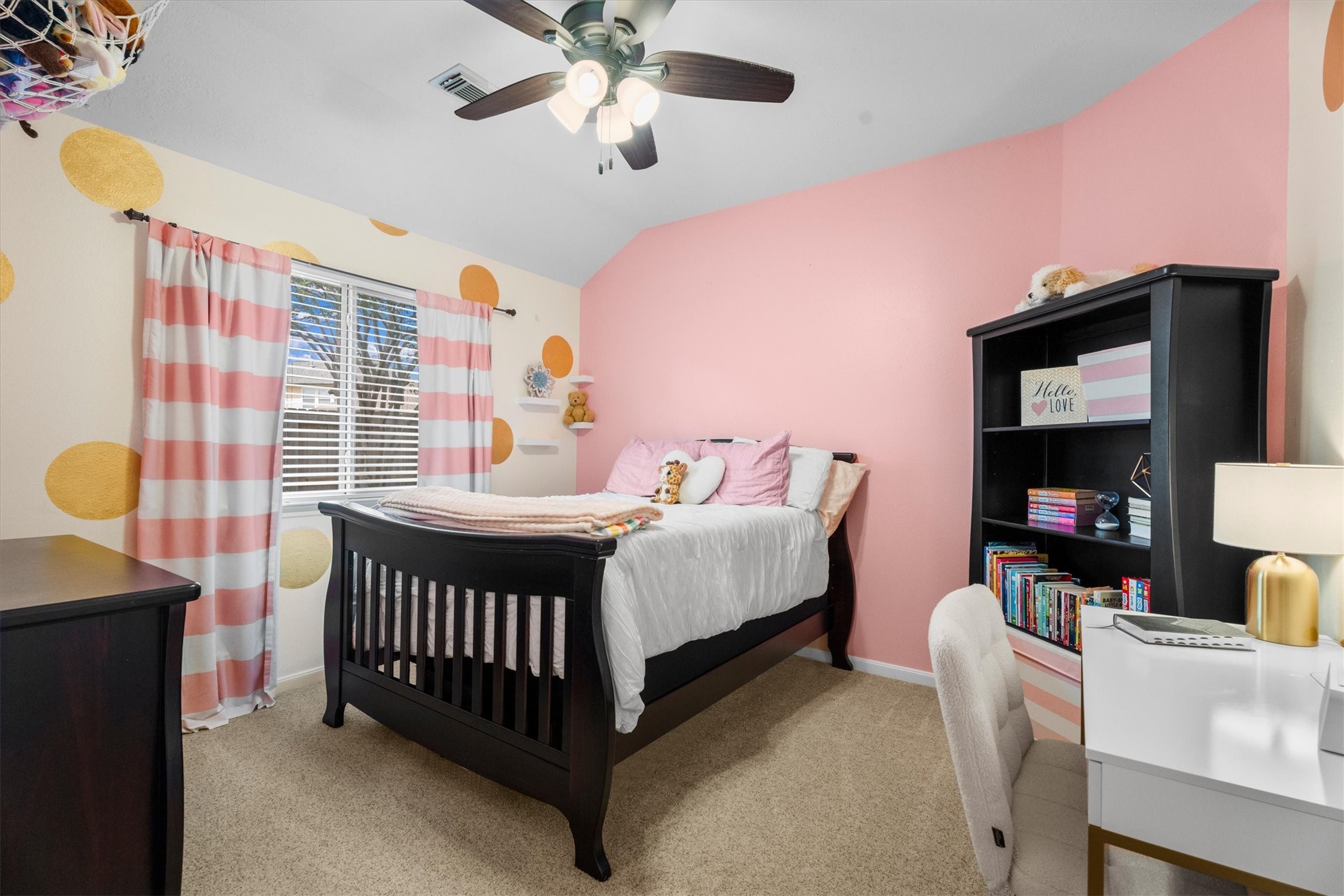 18502 Cascade Timbers Lane Tomball, TX 77377 - Photo 28 of 43 Bright and well-appointed, this secondary bedroom includes a ceiling fan and abundant storage, making it a versatile space to suit a variety of needs.