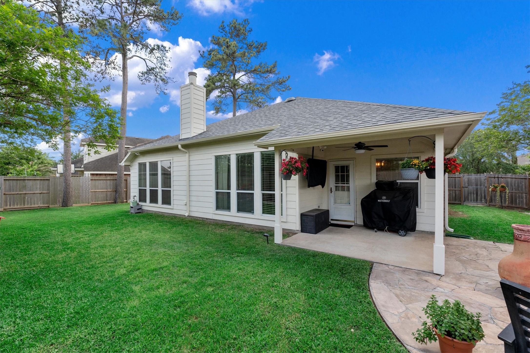 18502 Cascade Timbers Lane Tomball, TX 77377 - Photo 30 of 43 The covered patio will be a favorite spot.