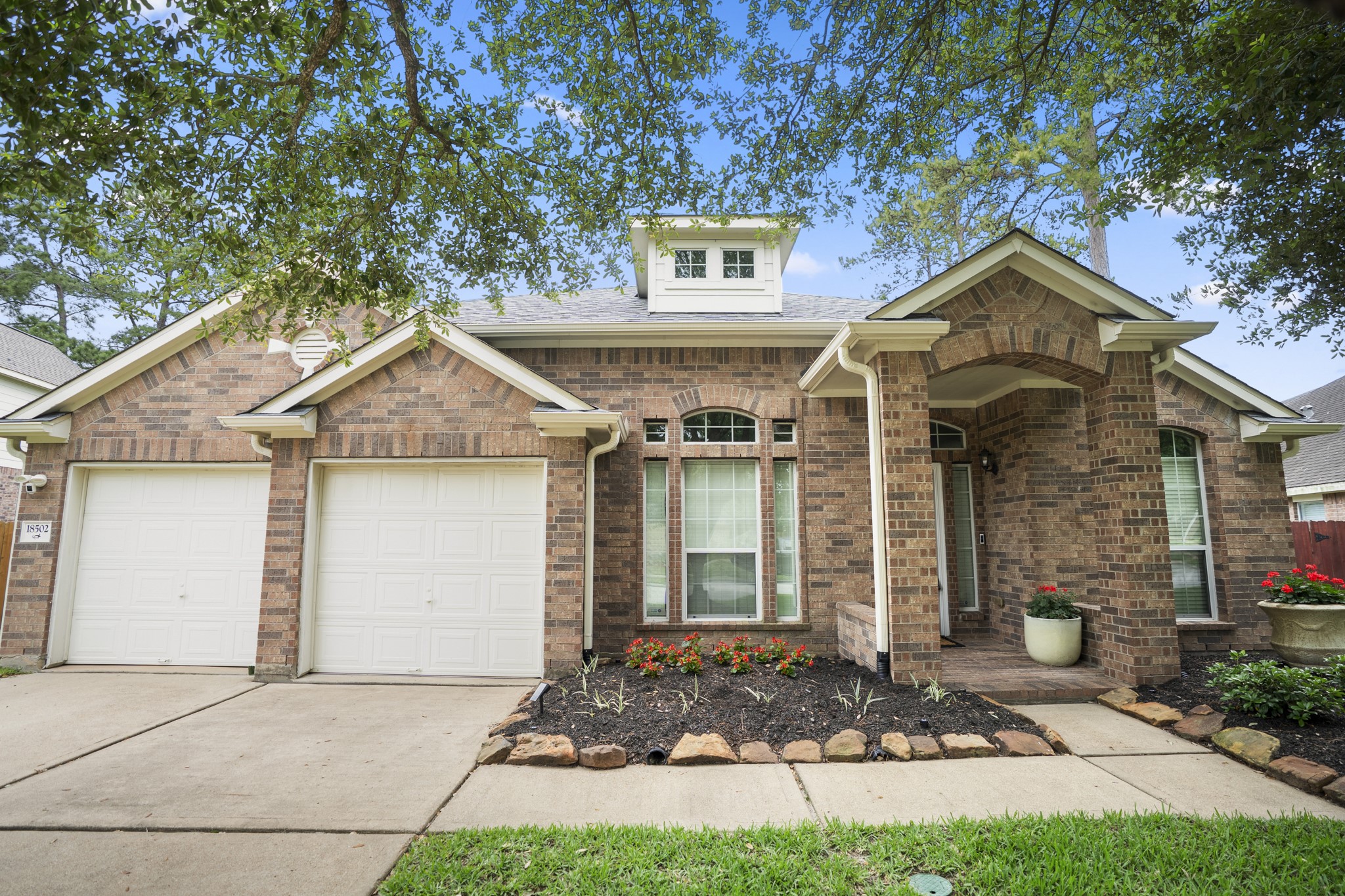 18502 Cascade Timbers Lane Tomball, TX 77377 - Photo 3 of 43 The inviting exterior and manicured yard make a lasting first impression. Fresh paint and updated landscaping add the perfect touch. This one is ready for you from start to finish.