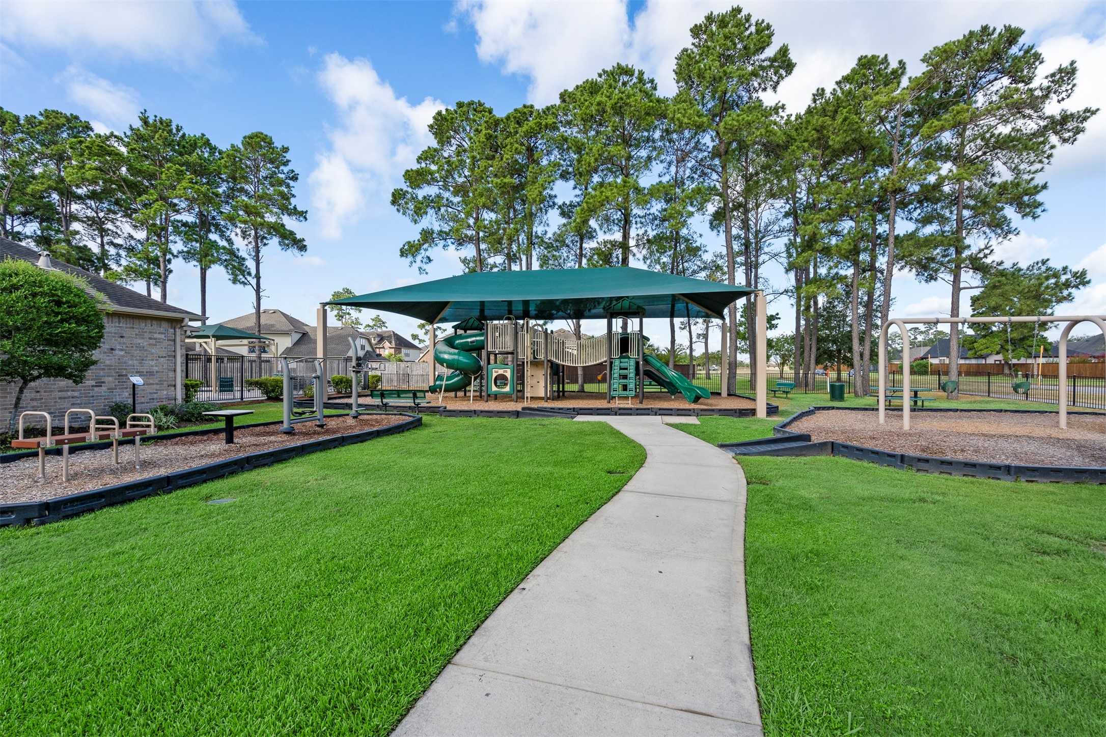 18502 Cascade Timbers Lane Tomball, TX 77377 - Photo 40 of 43 The community playground is the perfect spot for kids to run, play, and make memories with friends.