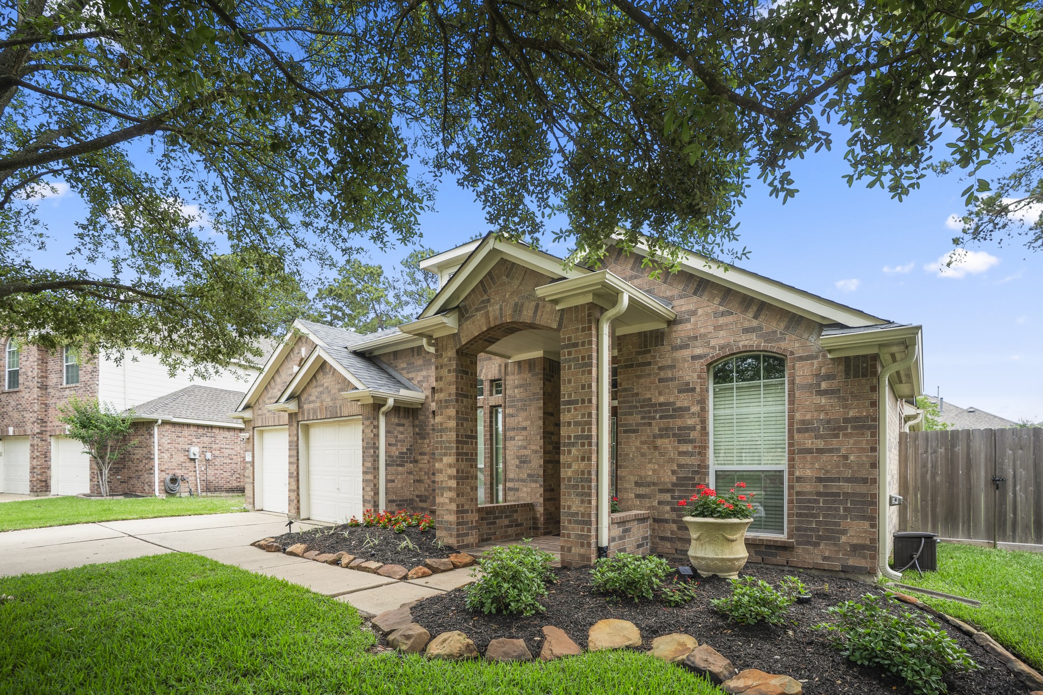 18502 Cascade Timbers Lane Tomball, TX 77377 - Photo 4 of 43 From the moment you arrive, this one-story in Villages of Northpointe feels like home.