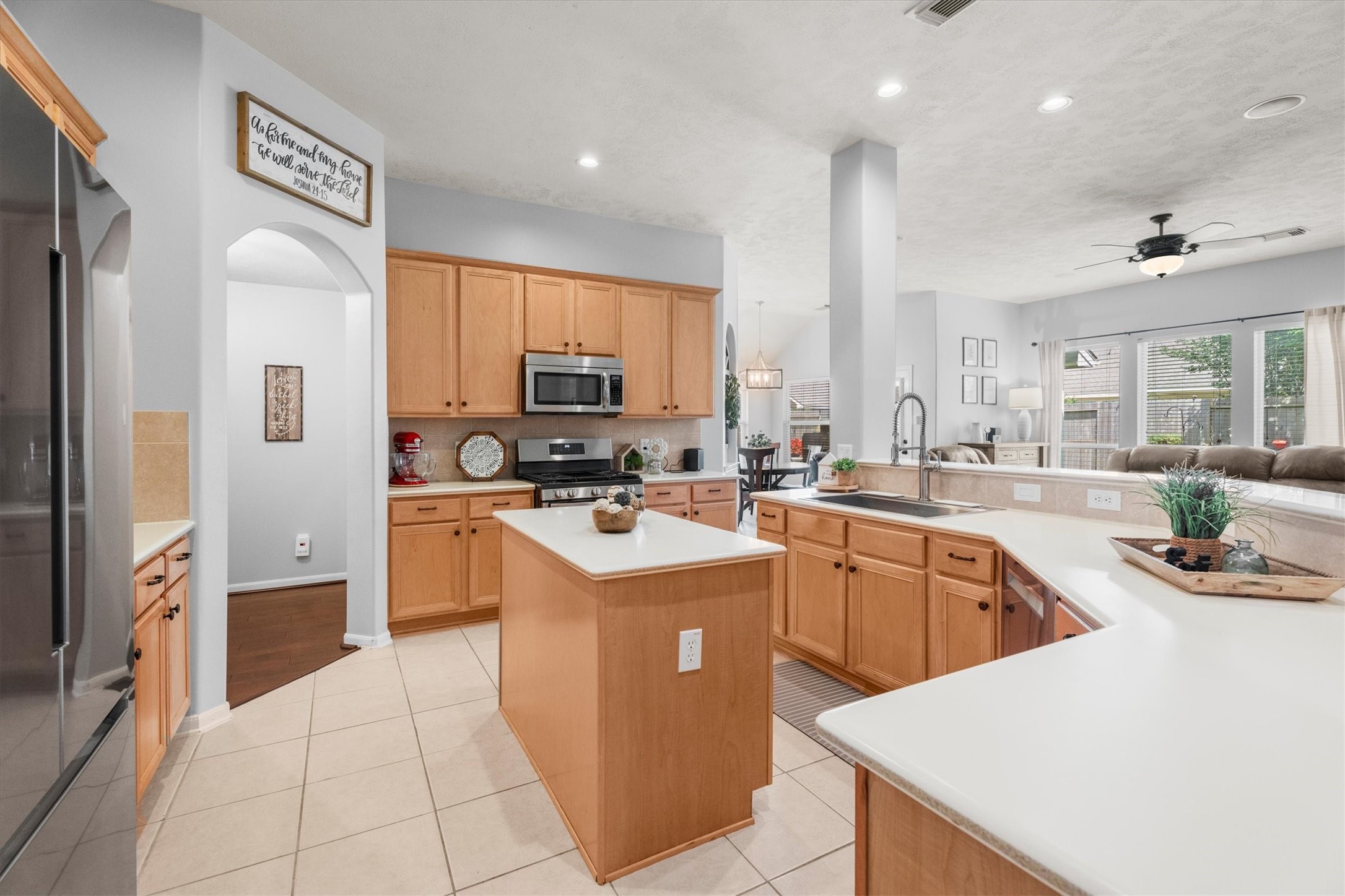 18502 Cascade Timbers Lane Tomball, TX 77377 - Photo 10 of 43 The spacious kitchen truly serves as the heart of the home, offering abundant cabinet space, updated appliances, and a layout that flows effortlessly into the surrounding living areas.
