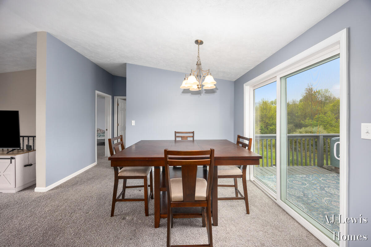 4810 Buehler Road Hastings, MI 49058 - Photo 5 of 25 Dining area w/slider to wrap around deck