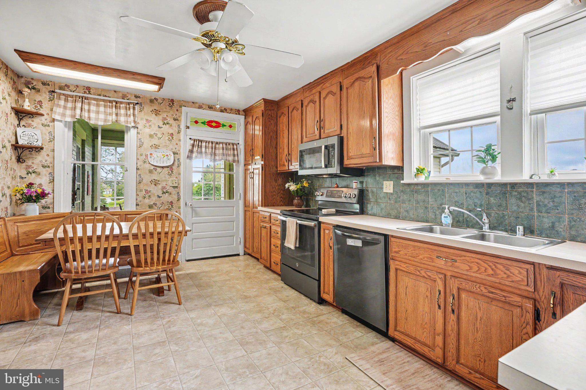 420 Carlisle Road Biglerville, PA 17307 - Photo 10 of 41 a kitchen with a window a sink and appliances