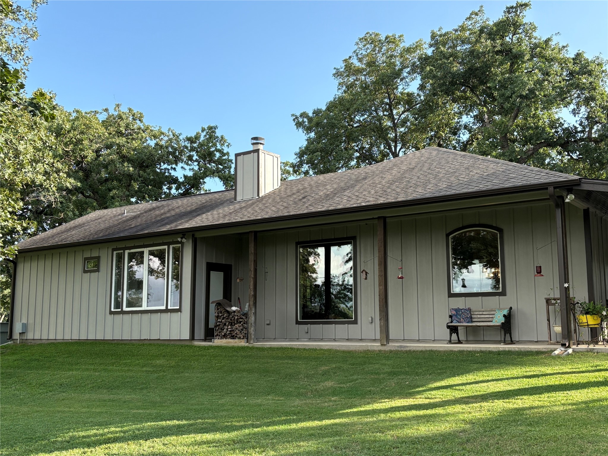 8595 Jared Road Bellville, TX 77418 - Photo 2 of 30 Enjoy this backyard porch and another access to this wonderful home!
