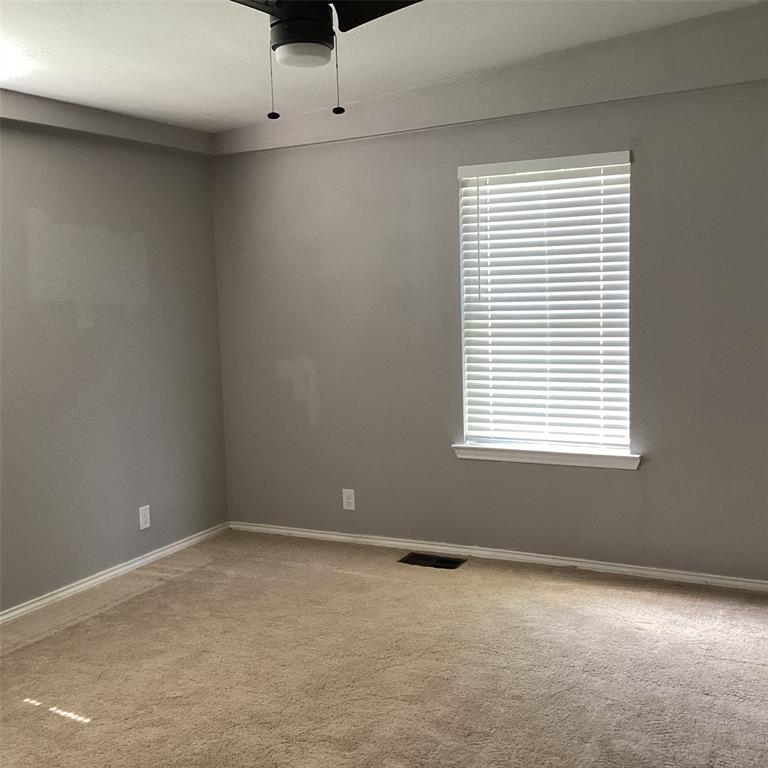 1506 South Travis Street Denison, TX 75021 - Photo 15 of 22 Master bedroom