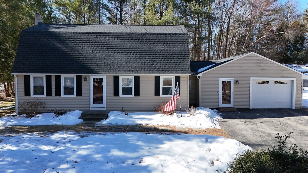102 Lower Gore Road Webster, MA 01570 - Photo 1 of 40 a front view of a house with a yard