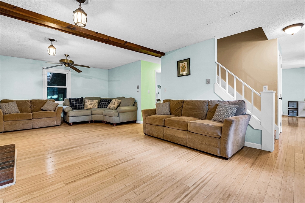 102 Lower Gore Road Webster, MA 01570 - Photo 17 of 40 a living room with furniture and wooden floor