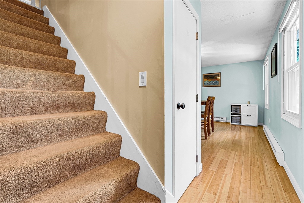 102 Lower Gore Road Webster, MA 01570 - Photo 18 of 40 a view of entryway and hall with wooden floor