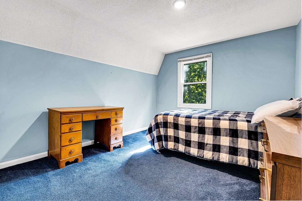 102 Lower Gore Road Webster, MA 01570 - Photo 26 of 40 a bedroom with a bed and a window