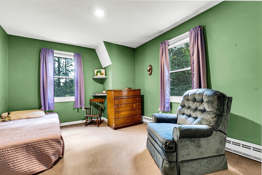 102 Lower Gore Road Webster, MA 01570 - Photo 27 of 40 a bedroom with a bed and a window