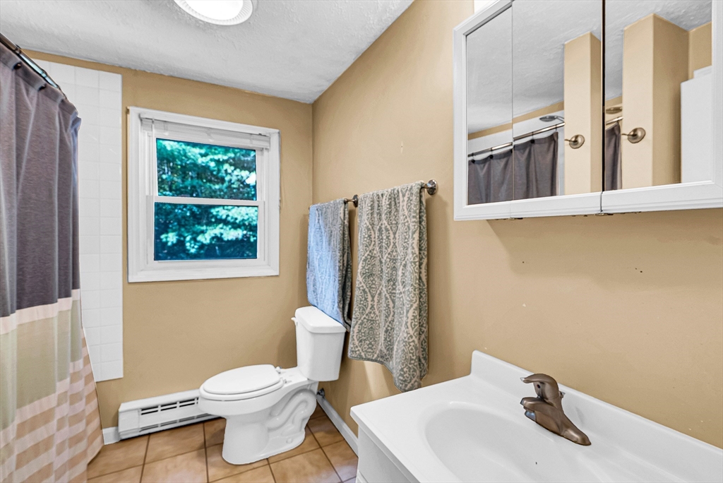102 Lower Gore Road Webster, MA 01570 - Photo 29 of 40 a bathroom with a sink and a toilet