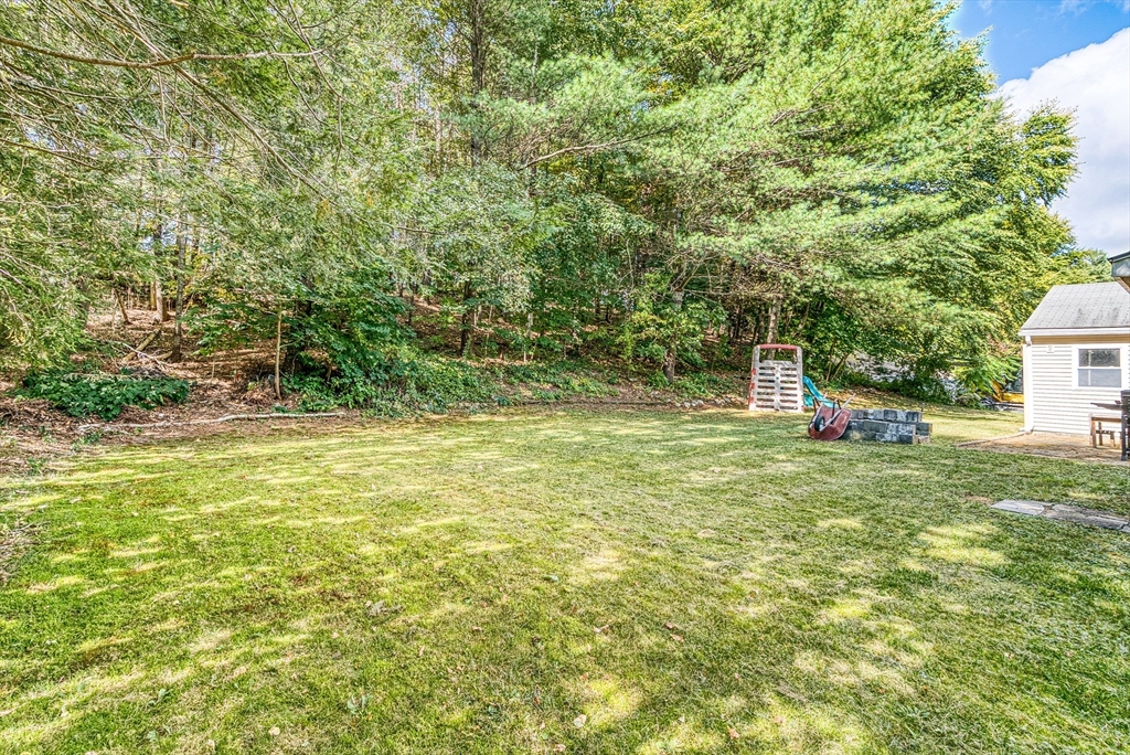 102 Lower Gore Road Webster, MA 01570 - Photo 33 of 40 a fire hydrant in the middle of a field