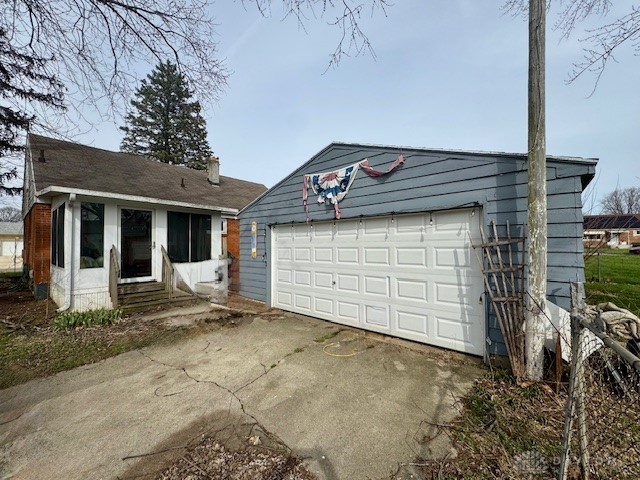 4733 Curtis Drive Springfield, OH 45503 - Photo 4 of 50 This charming home offers a convenient attached garage and inviting front entrance.
