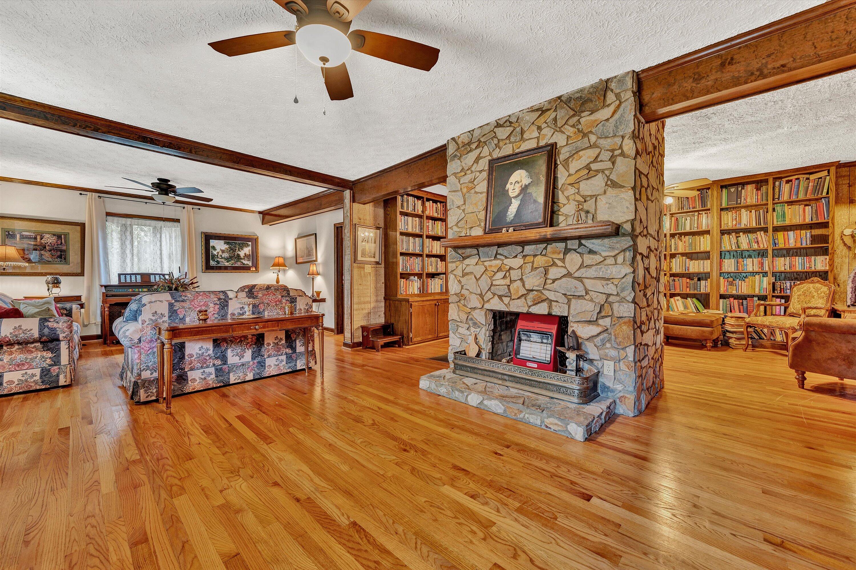 1117 Bouldin Road Ridgeway, VA 24148 - Photo 13 of 70 a living room with furniture and a fireplace