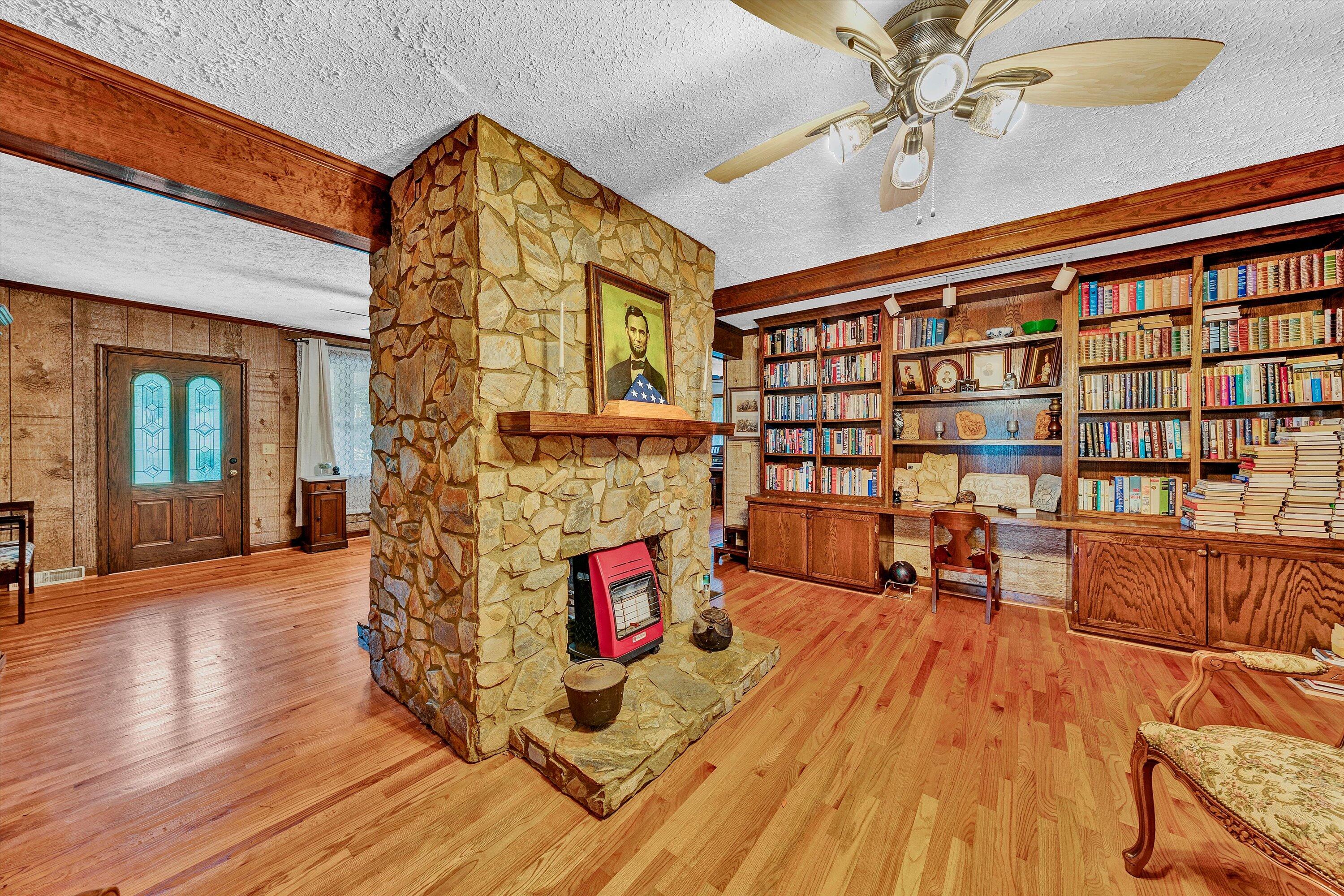 1117 Bouldin Road Ridgeway, VA 24148 - Photo 14 of 70 a view of a living room and a fireplace