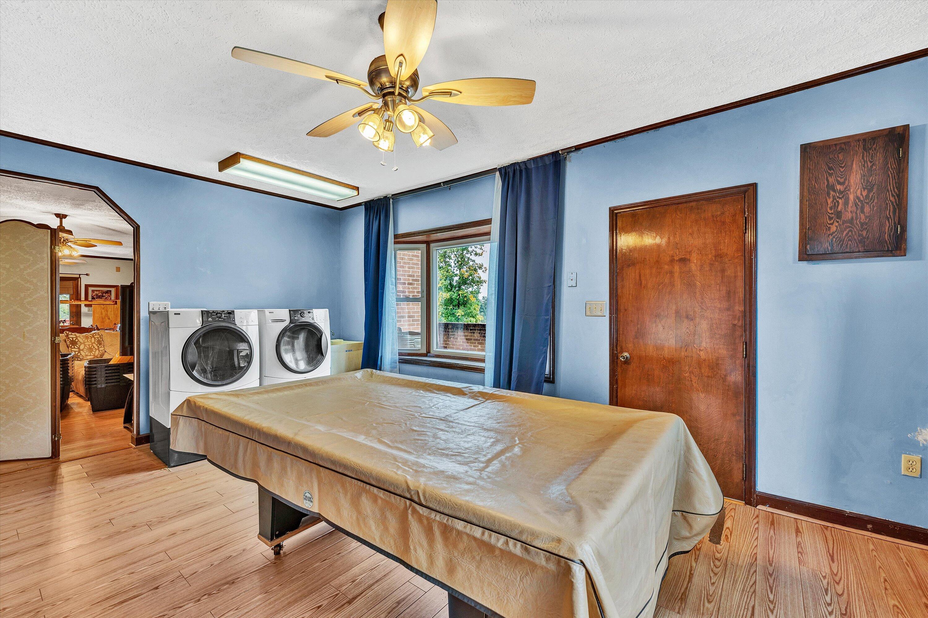1117 Bouldin Road Ridgeway, VA 24148 - Photo 20 of 70 a bedroom with a bed and a table in it