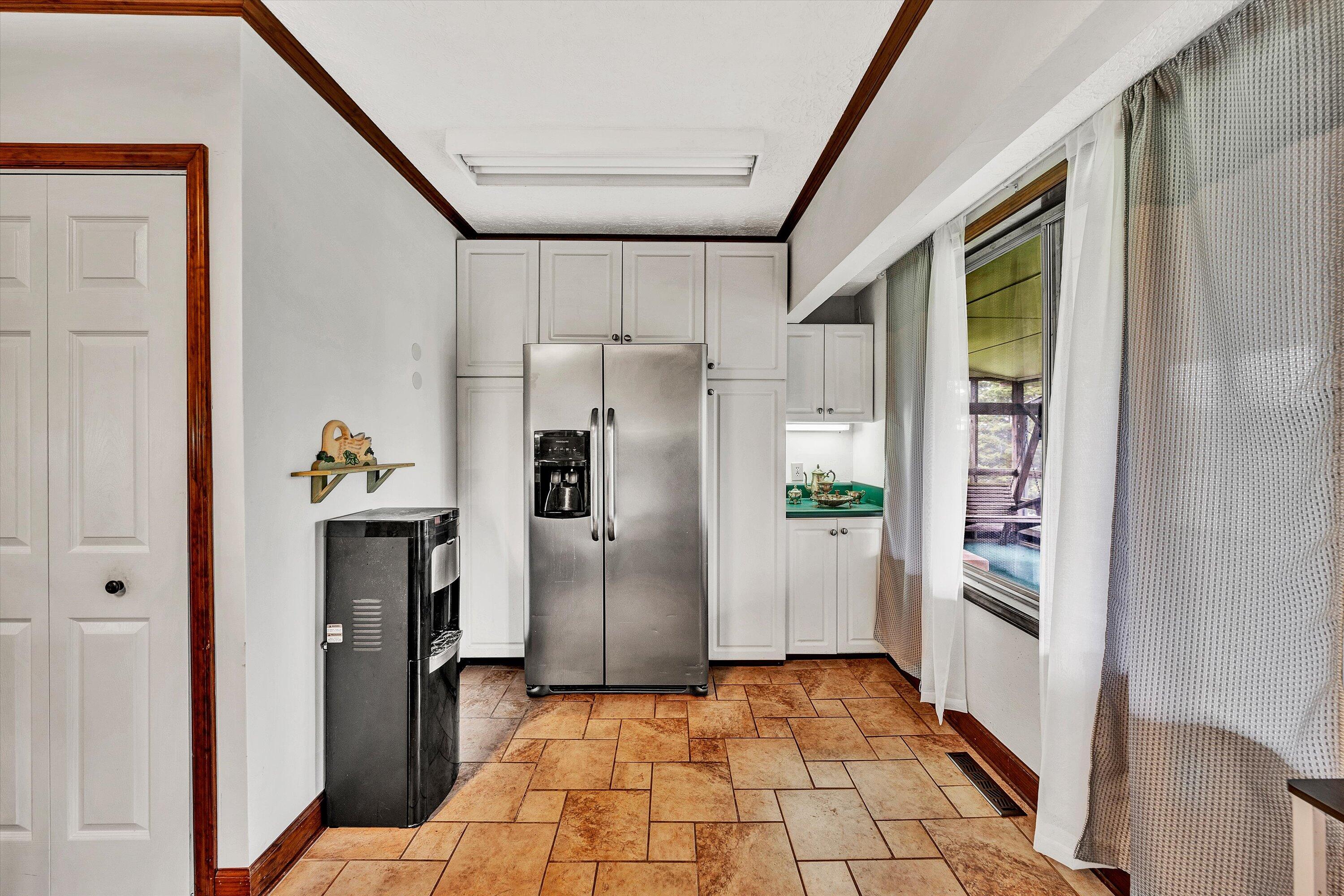 1117 Bouldin Road Ridgeway, VA 24148 - Photo 28 of 70 a kitchen with a refrigerator and a sink