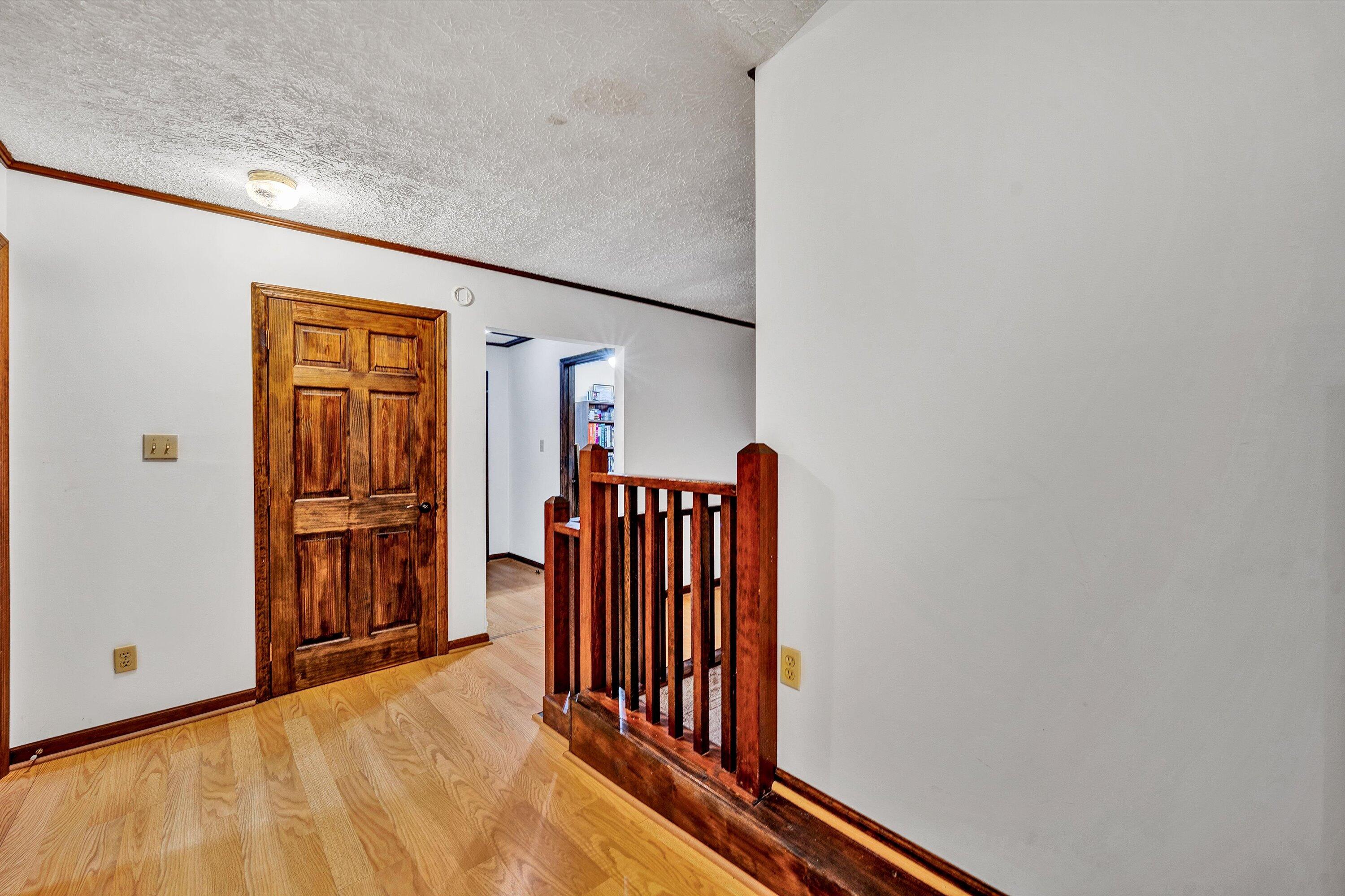 1117 Bouldin Road Ridgeway, VA 24148 - Photo 30 of 70 a view of hallway with wooden floor