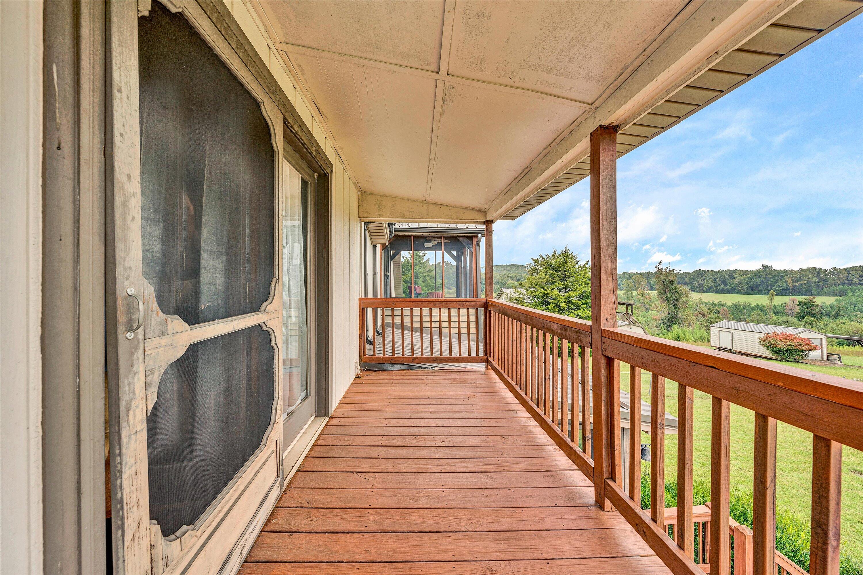 1117 Bouldin Road Ridgeway, VA 24148 - Photo 33 of 70 a view of a balcony with wooden floor