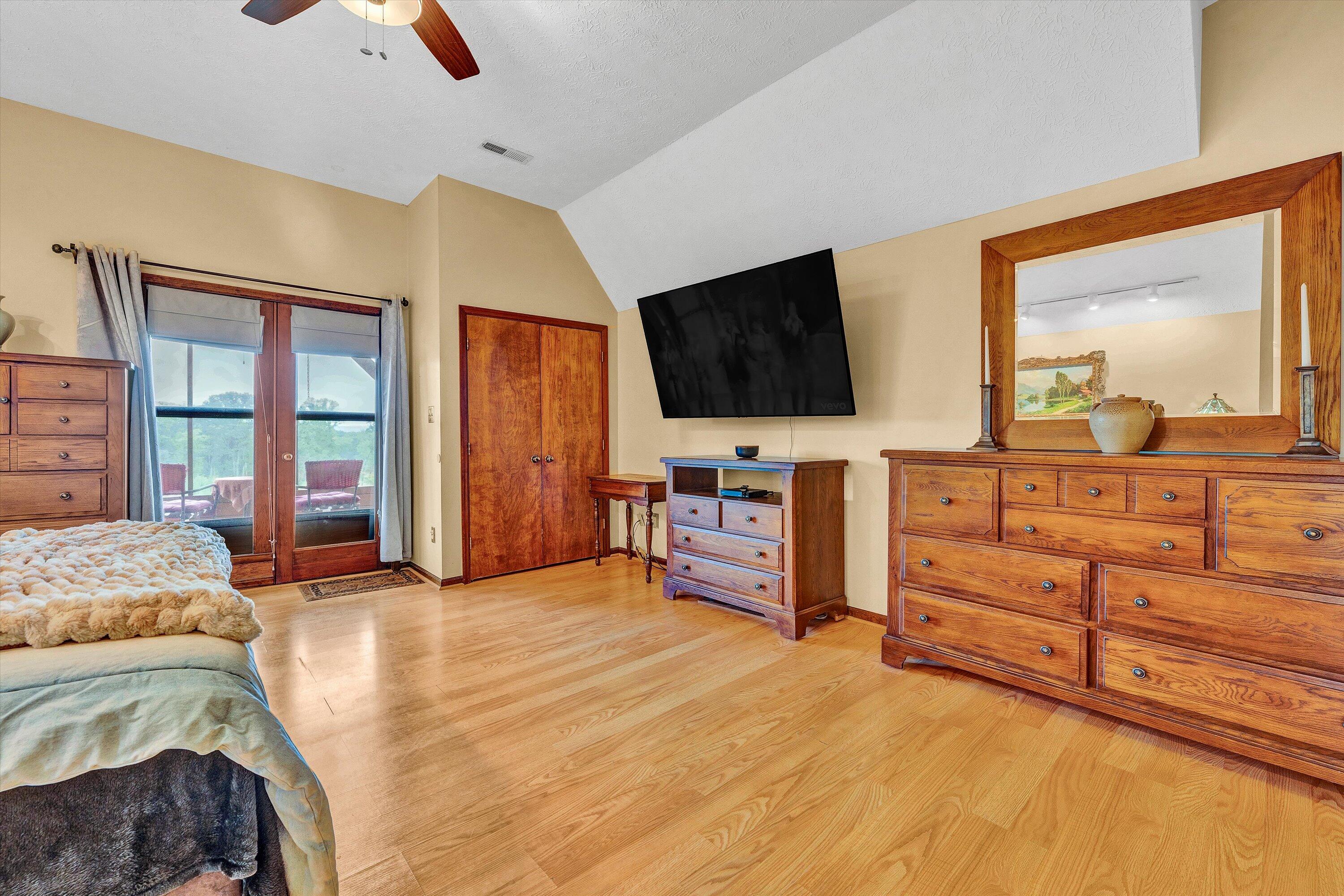 1117 Bouldin Road Ridgeway, VA 24148 - Photo 37 of 70 a bedroom with furniture and a flat screen tv