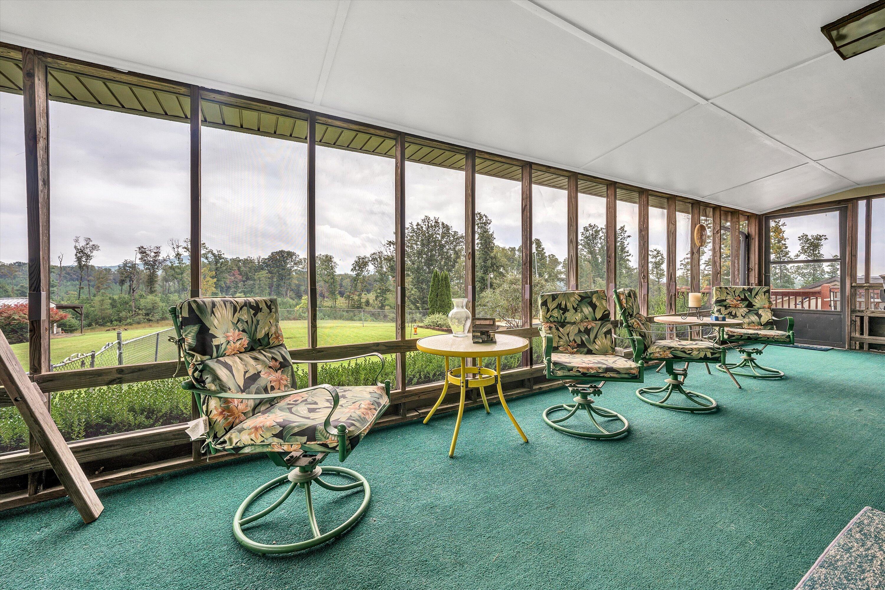1117 Bouldin Road Ridgeway, VA 24148 - Photo 44 of 70 a living room with furniture and a large window