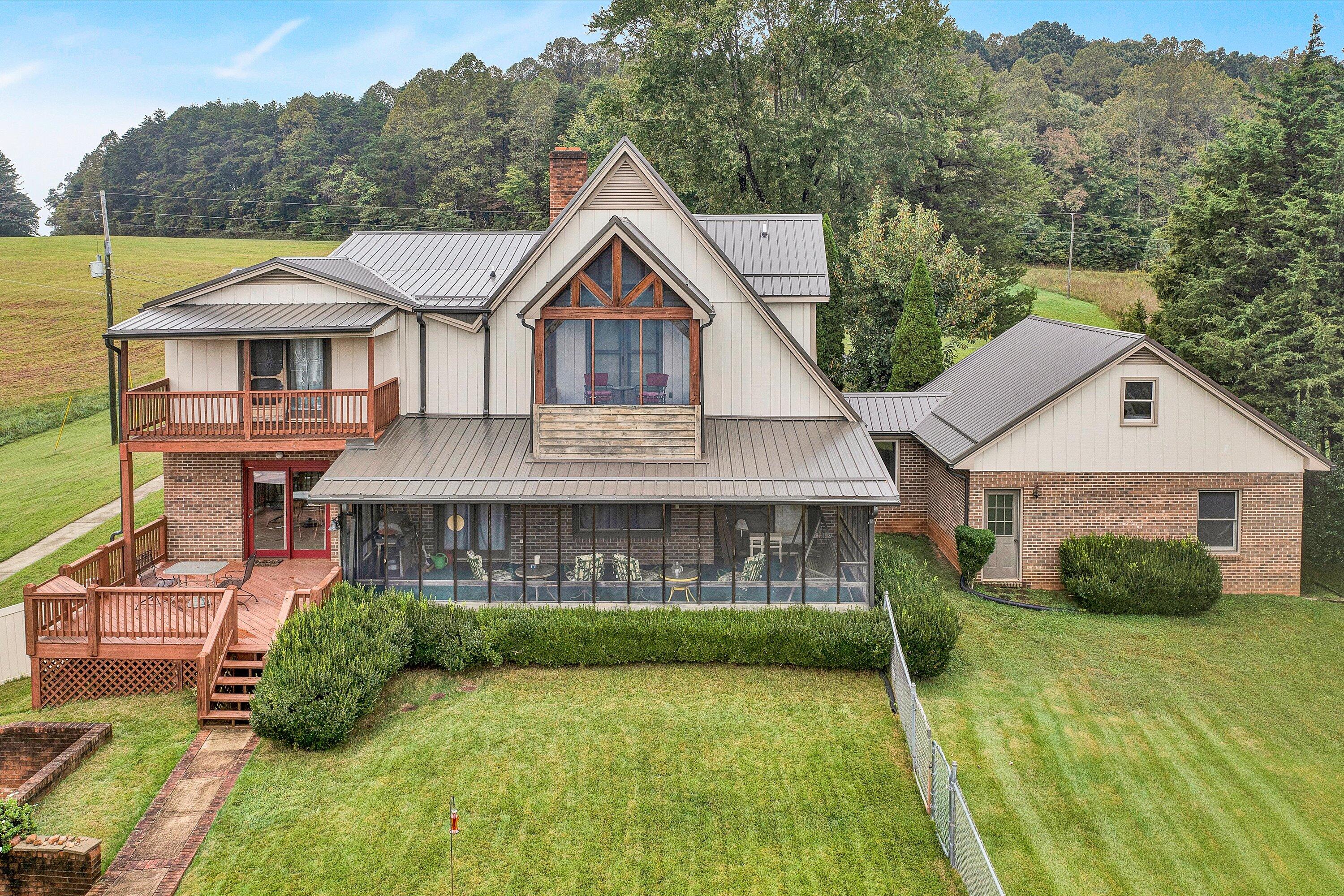 1117 Bouldin Road Ridgeway, VA 24148 - Photo 46 of 70 a front view of a house with yard and green space