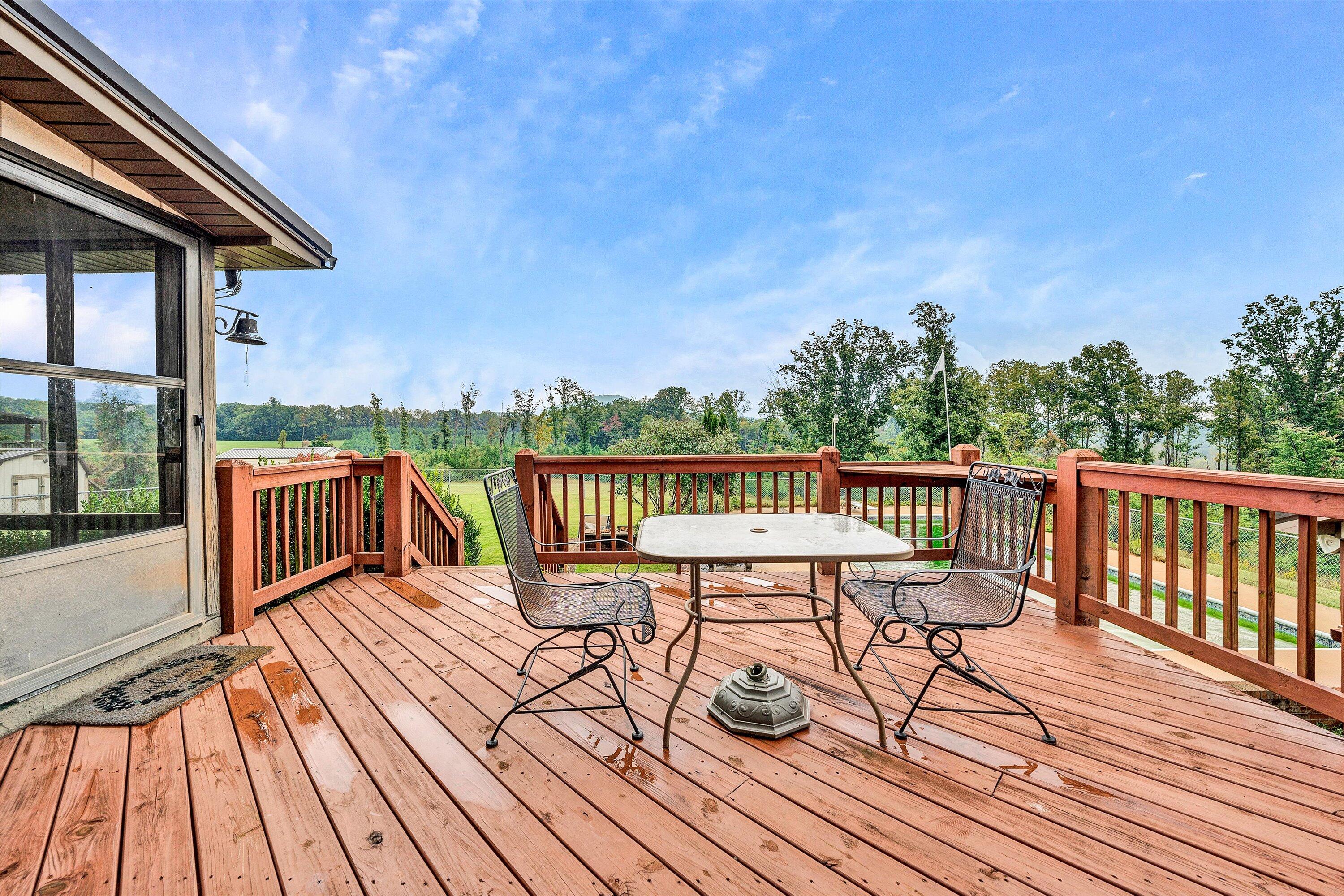 1117 Bouldin Road Ridgeway, VA 24148 - Photo 54 of 70 a view of a chairs on wooden deck