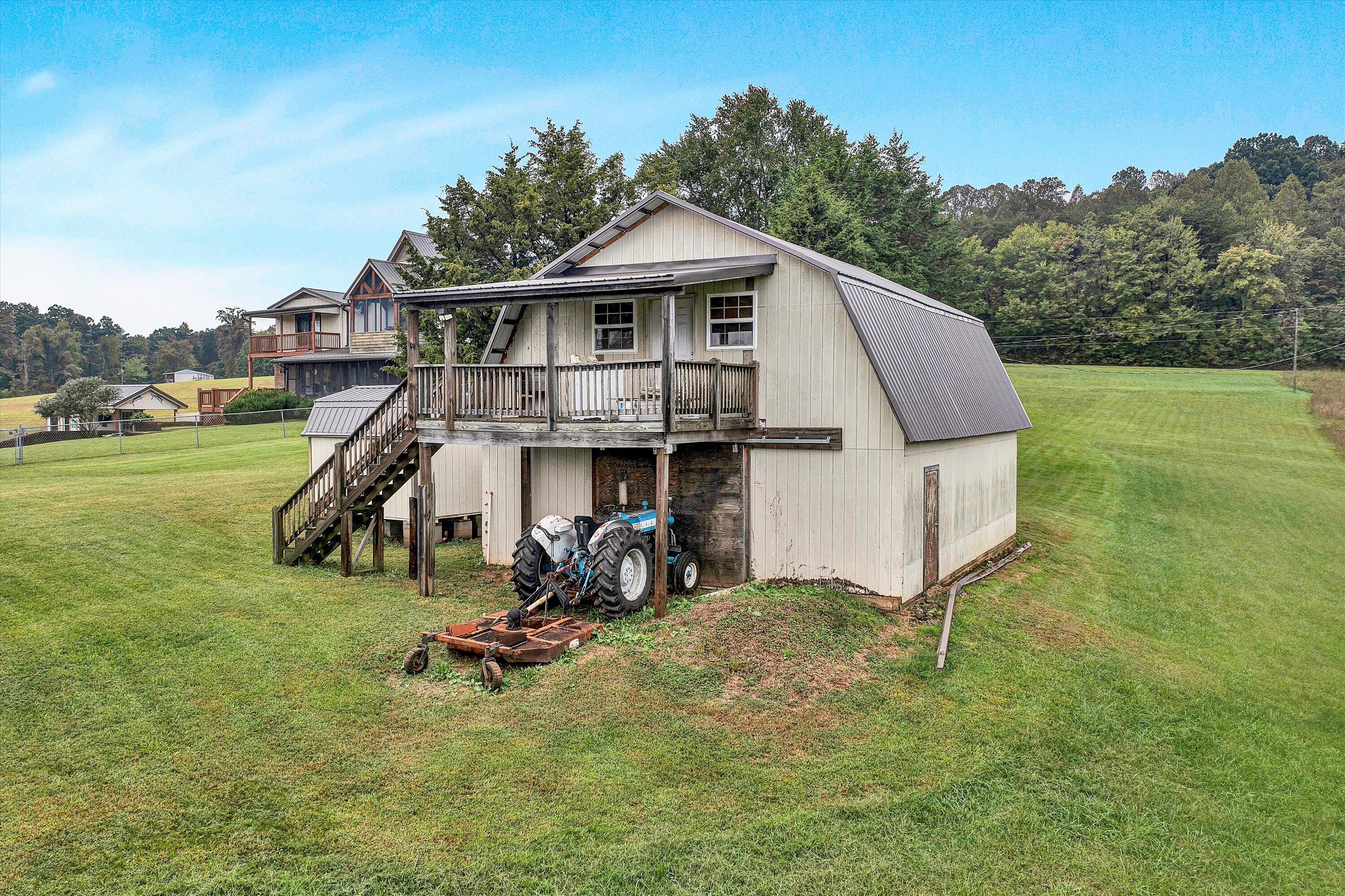 1117 Bouldin Road Ridgeway, VA 24148 - Photo 57 of 70 a view of a house with a yard and sitting area