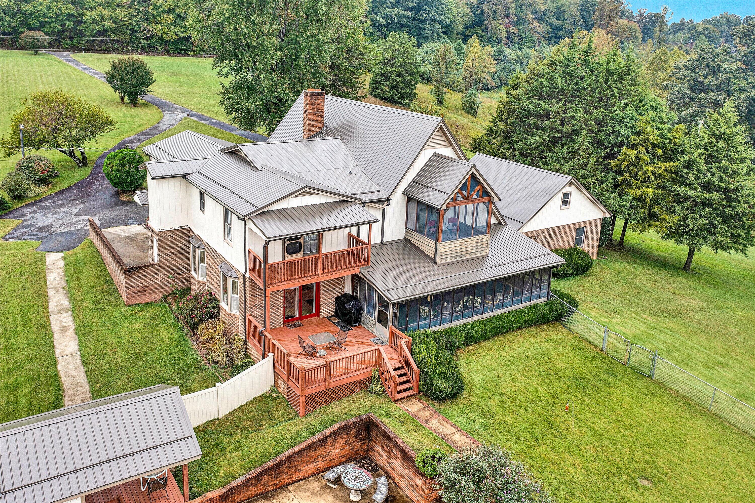 1117 Bouldin Road Ridgeway, VA 24148 - Photo 59 of 70 an aerial view of a house with swimming pool garden and patio