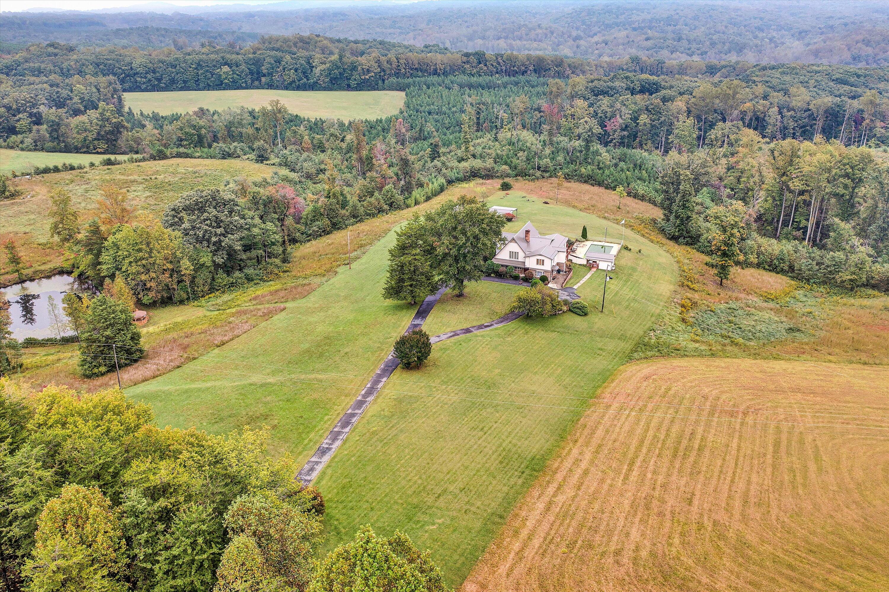 1117 Bouldin Road Ridgeway, VA 24148 - Photo 67 of 70 a view of a lake with a mountain