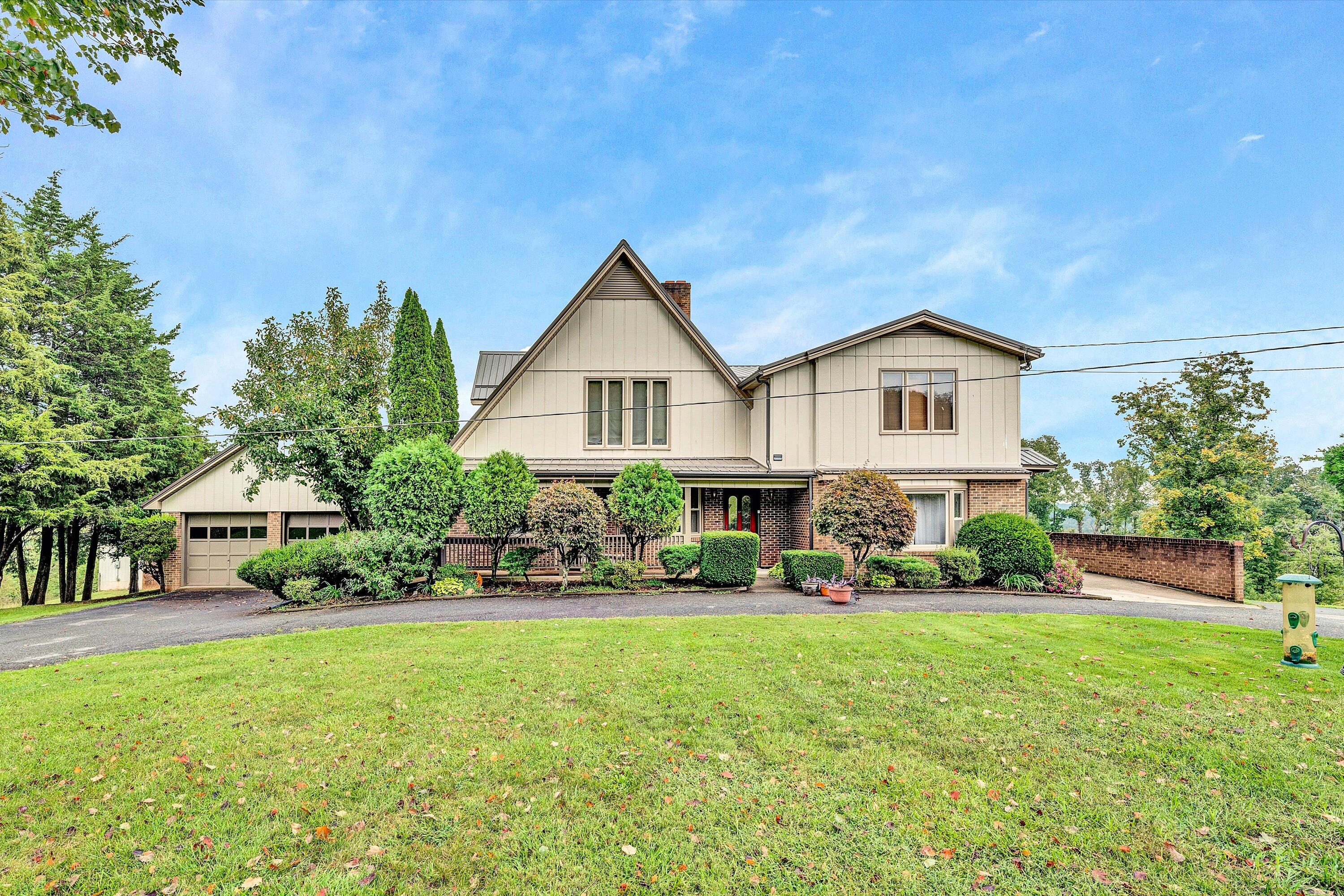 1117 Bouldin Road Ridgeway, VA 24148 - Photo 69 of 70 a front view of a house with a yard