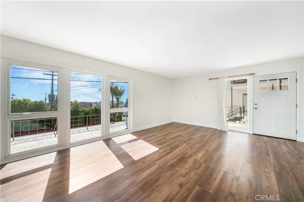 a kitchen with granite countertop a sink and a stove
