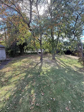 a view of outdoor space with deck and yard